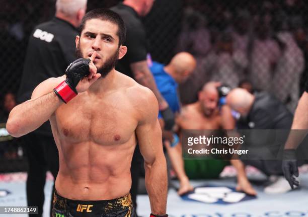 Islam Makhachev of Russia reacts after his knockout victory against Alexander Volkanovski of Australia in the UFC lightweight championship fight...