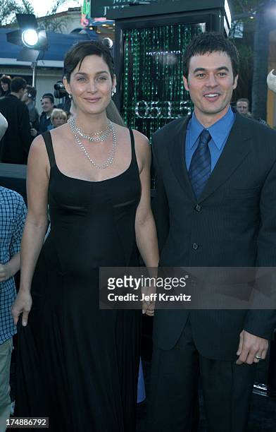 Carrie-Anne Moss and Steven Roy during "The Matrix Reloaded" Premiere at Mann Village Theater in Westwood, California, United States.