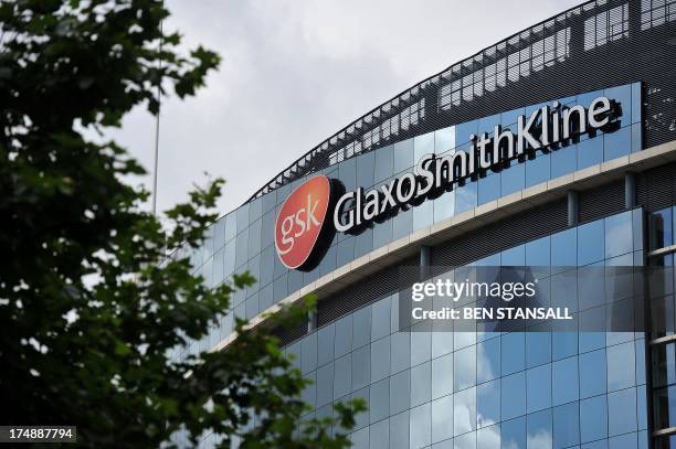 The headquarters of pharmaceutical company GlaxoSmithKline is pictured in west London on July 29, 2013. AFP PHOTO / BEN STANSALL