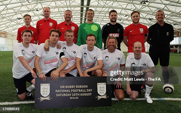 Team Grimshaw captain Nick Grimshaw , Robbie Savage and team-mates line up with Team Murs captain Olly Murs , David May and team-mates before the...