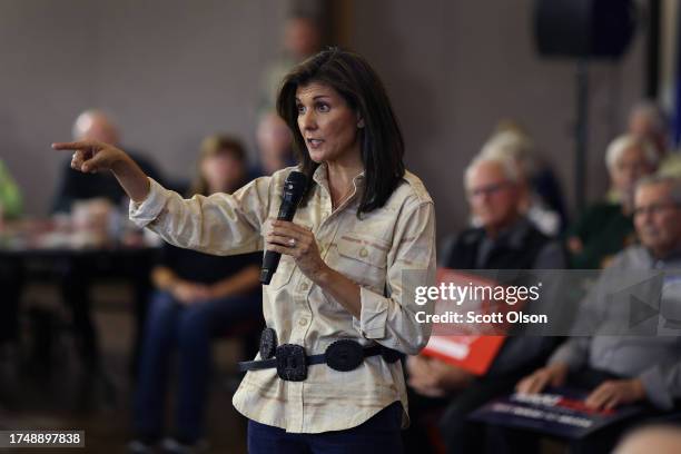 Republican presidential candidate former U.N. Ambassador Nikki Haley speaks to potential voters during a campaign event at Central College on October...