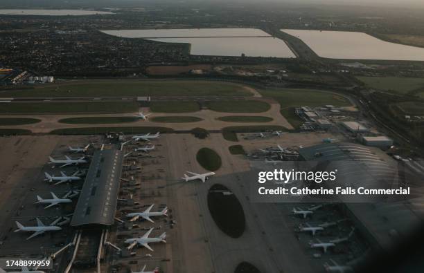 ariel view of an airport hanger - flight path stock pictures, royalty-free photos & images