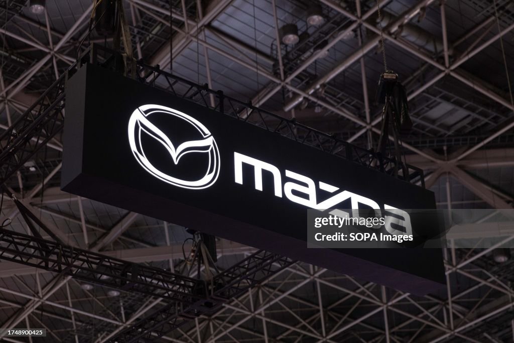 Japanese car maker Mazda company logo above their exhibition...