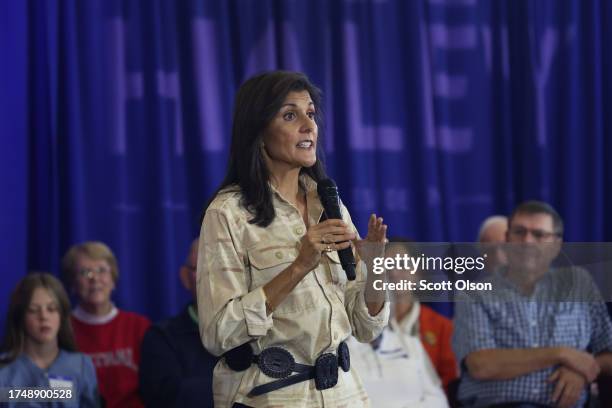 Republican presidential candidate former U.N. Ambassador Nikki Haley speaks to potential voters during a campaign event at Central College on October...