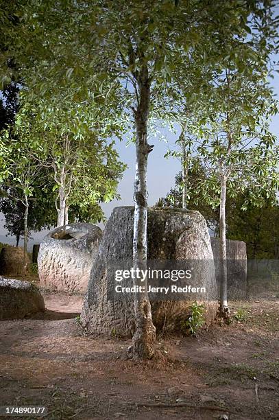 Group of jars is illuminated by moonlight and strobe in this long exposure under the nearly full moon at Site 2 near Phonsavan..