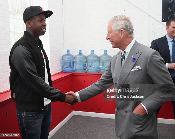 Prince Charles, Prince of Wales meets Jamal Edwards during a live session at the launch of the Prince's Trust Summer Sessions at the Princes's Trust...