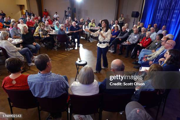 Republican presidential candidate former U.N. Ambassador Nikki Haley speaks to potential voters during a campaign event at Central College on October...