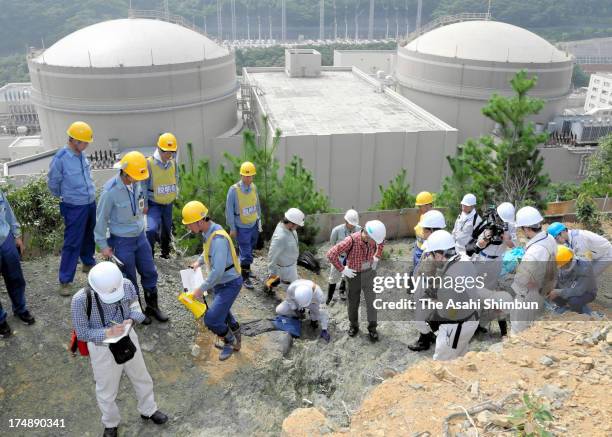 Researchers of Nuclear Regulation Authority investigate 'F-6' fault at Kansai Electric Power Co Oi Nuclear Power Plant on July 28, 2013 in Oi, Fukui,...