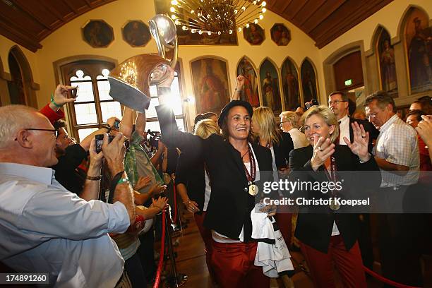 Nadine Angerer and head coach Silvia Neid during the celebration of the Women's team of Germany at Kaisersaal on July 29, 2013 in Frankfurt am Main,...