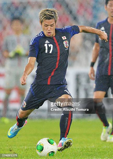 Hotaru Yamaguchi of Japan in action during the EAFF East Asian Cup match between Korea Republic and Japan at Jamsil Stadium on July 28, 2013 in...