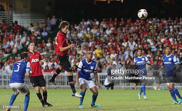 Adnan Januzaj of Manchester United scores their fourth goal during the pre-season friendly match between Kitchee FC and Manchester United as part of...