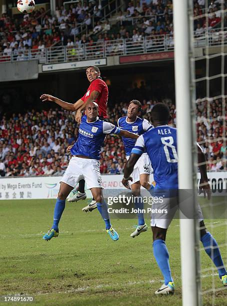 Chris Smalling of Manchester United scores their second goal during the pre-season friendly match between Kitchee FC and Manchester United as part of...