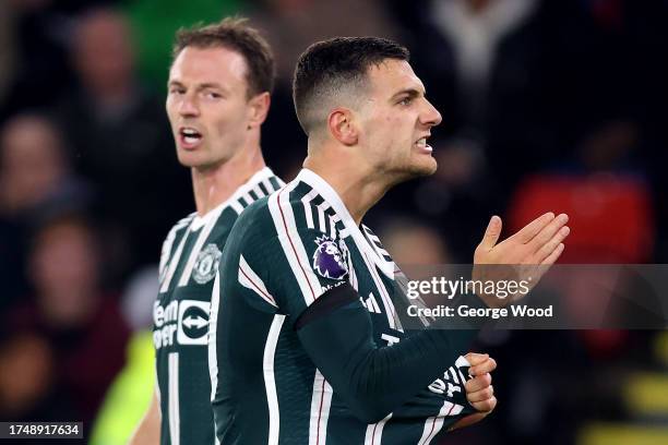 Diogo Dalot of Manchester United celebrates after scoring the team's second goal during the Premier League match between Sheffield United and...