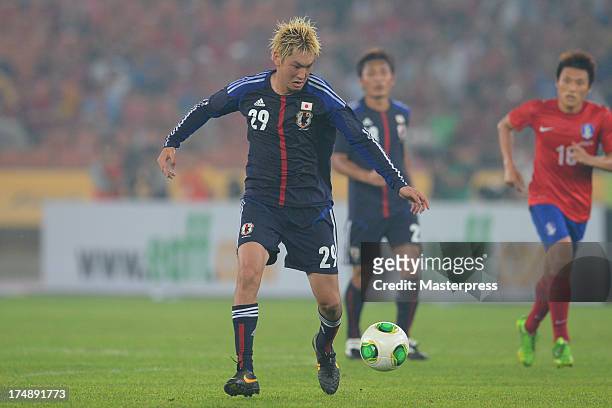 Yojiro Takahagi of Japan in action during the EAFF East Asian Cup match between Korea Republic and Japan at Jamsil Stadium on July 28, 2013 in Seoul,...