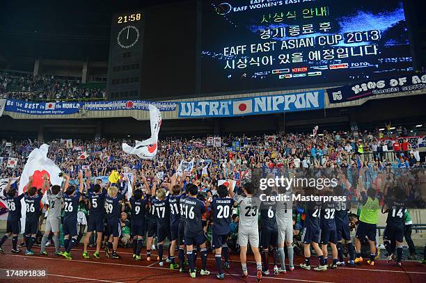 Japan players celebrate with the trophy after winning the EAFF East Asian Cup 2013 at Jamsil Stadium on July 28, 2013 in Seoul, South Korea.