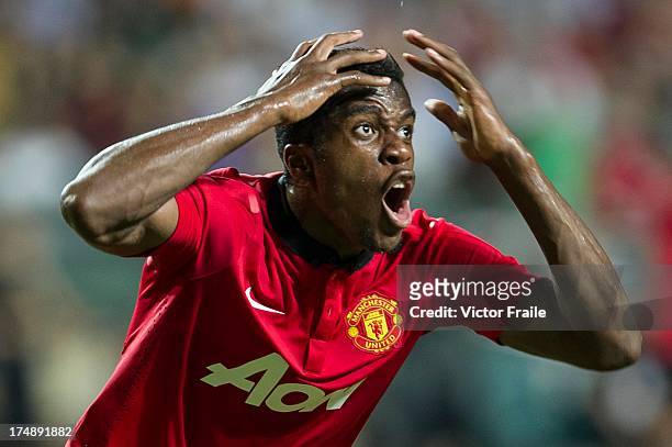 Wilfried Zaha of Manchester United reacts after missing an opportunity to score during the international friendly match between Kitchee FC and...