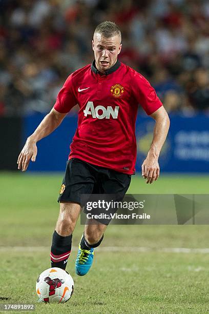 Tom Cleverley of Manchester United runs with the ball during the international friendly match between Kitchee FC and Manchester United at Hong Kong...