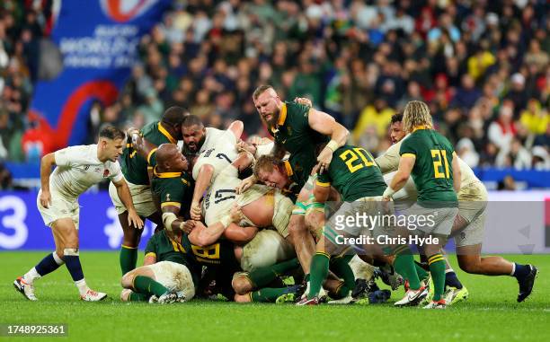 Players of South Africa and England contest the maul during the Rugby World Cup France 2023 match between England and South Africa at Stade de France...