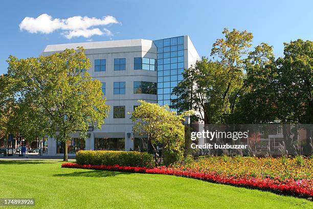 colorful park in an office district - office building exterior small stock pictures, royalty-free photos & images