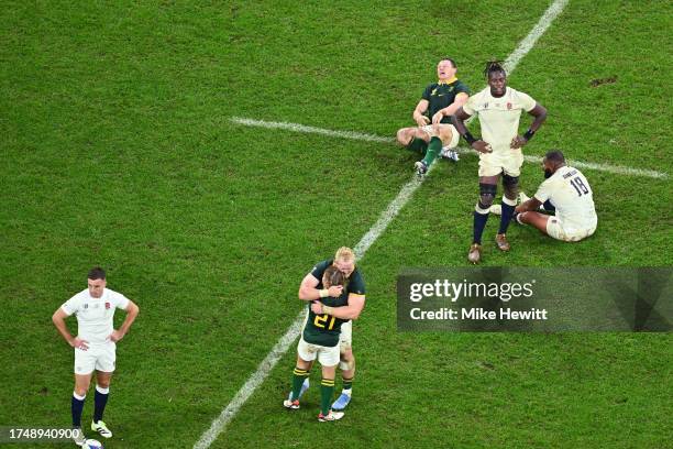 George Ford, Maro Itoje and Kyle Sinckler of England look dejected at full-time after their team's defeat in the Rugby World Cup France 2023 match...