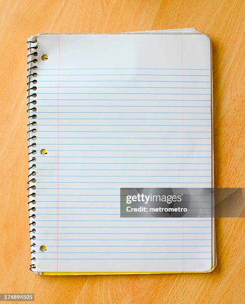 open spiral bound notebook on desk - spiral notebook stock pictures, royalty-free photos & images