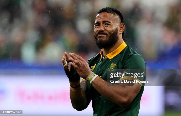 Manu Tuilagi of England applauds the fans as he wears a South Africa shirt following the team's defeat during the Rugby World Cup France 2023 match...