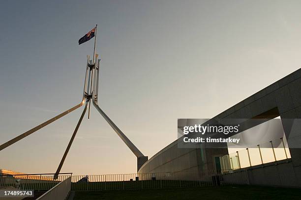 australian flag - parliament house canberra stock pictures, royalty-free photos & images