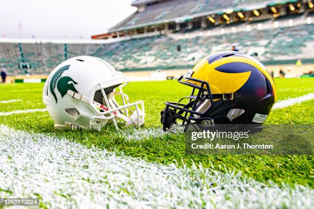 General view of the Michigan Wolverines and Michigan State Spartans helmets before a college football game between the Michigan Wolverines and the...