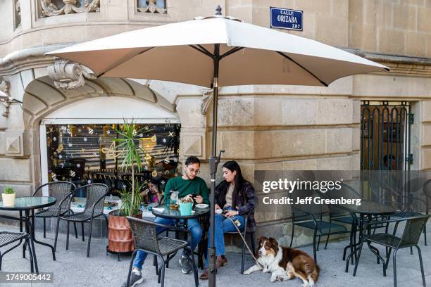 Mexico City, Mexico, Roma Norte Cuauhtemoc, Caravanserai French Teahouse tearoom couple with dog at outdoor table.