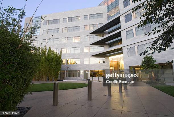 office building with landscaping - small apartment stock pictures, royalty-free photos & images