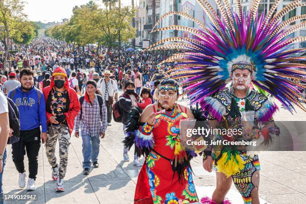 Mexico City, Mexico, Day of the Virgin of Guadalupe, Plaza Mariana Avenida Montevideo, procession of Indigenous Indians in traditional clothing with...