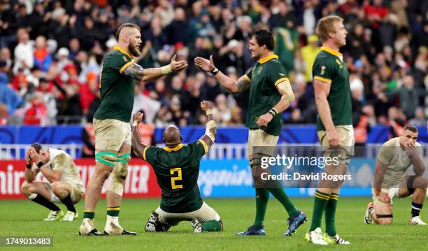 Mbongeni Mbonambi of South Africa celebrates victory at full-time following the Rugby World Cup France 2023 match between England and South Africa at...