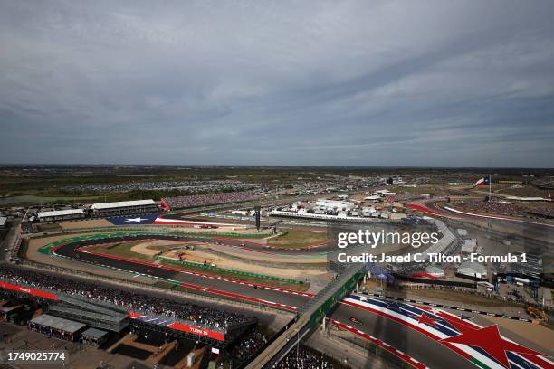 Max Verstappen of the Netherlands driving the Oracle Red Bull Racing RB19 leads Lewis Hamilton of Great Britain driving the Mercedes AMG Petronas F1...