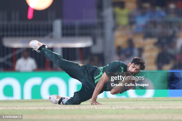 Pakistan's Haris Rauf takes a catch to dismiss Lungi Ngidi of South Africa during the ICC Men's Cricket World Cup 2023 match between South Africa and...