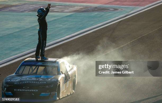 Sam Mayer, driver of the Accelerate Pros Talent Chevrolet, celebrates after winning the NASCAR Xfinity Series Contender Boats 300 at Homestead-Miami...