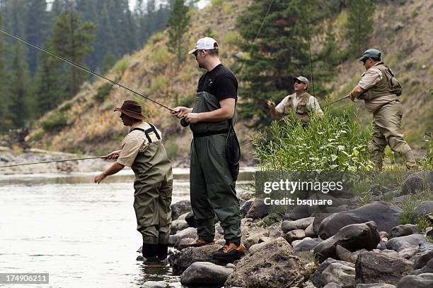 four dry fly fishermen - man fishing stock pictures, royalty-free photos & images