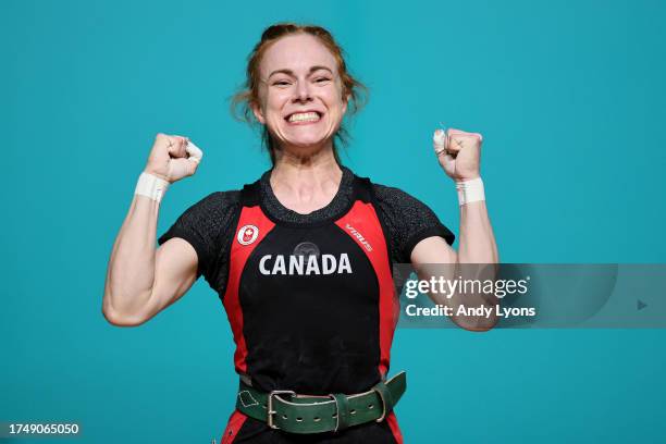 Amanda Melissa Braddock of Canada celebrates after competing in weightlifting - Women's 49Kg at Gimnasio Chimkowe de Peñalolen on Day 1 of Santiago...