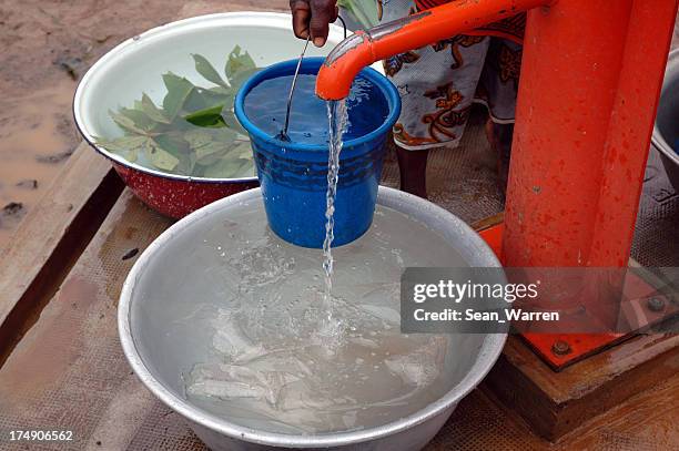 village water fountain - water well stock pictures, royalty-free photos & images