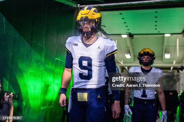 McCarthy of the Michigan Wolverines exits the tunnel before a college football game against the Michigan State Spartans at Spartan Stadium on October...