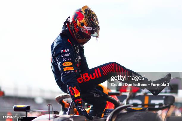 Sprint winner Max Verstappen of the Netherlands and Oracle Red Bull Racing climbs out of his car in parc ferme during the Sprint ahead of the F1...