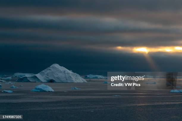 Icebergs at sunset in the Weddell Sea, Antarctica.