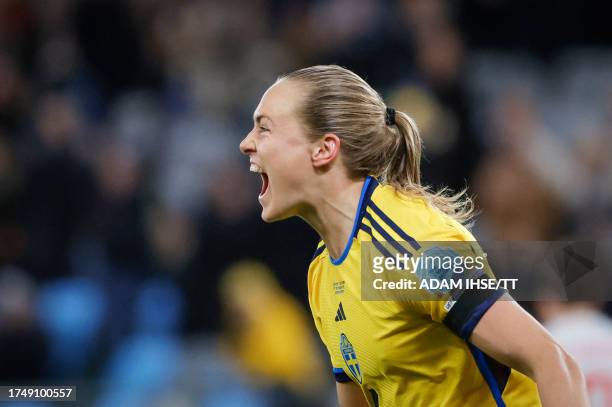 Sweden's defender Magdalena Eriksson celebrates after scoring the 1-0 opening goal during the UEFA Women's Nations League group A4 football match...