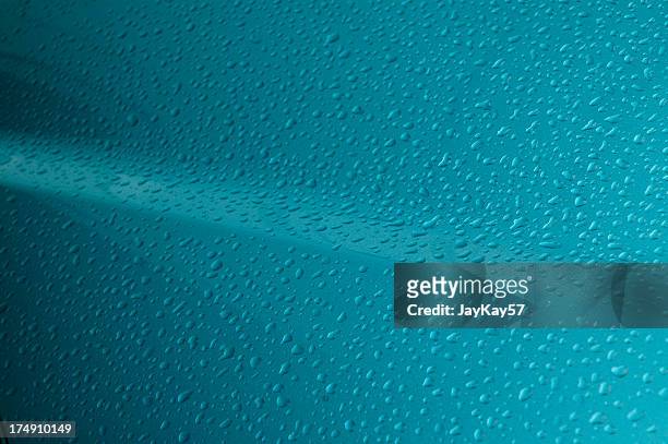 rain drops on car - shiny car stock pictures, royalty-free photos & images