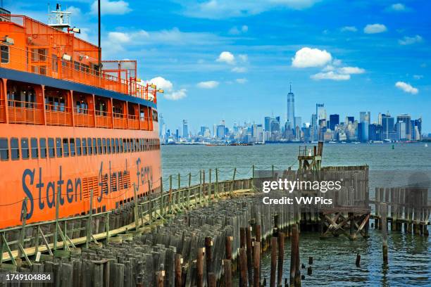 Financial District skyscrapers and the Staten Island Ferry. Lower Manhattan,New York City and Staten Island Harbor