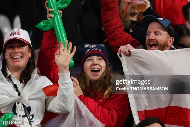 English supporters react prior to the France 2023 Rugby World Cup third-place match between Argentina and England at the Stade de France in...