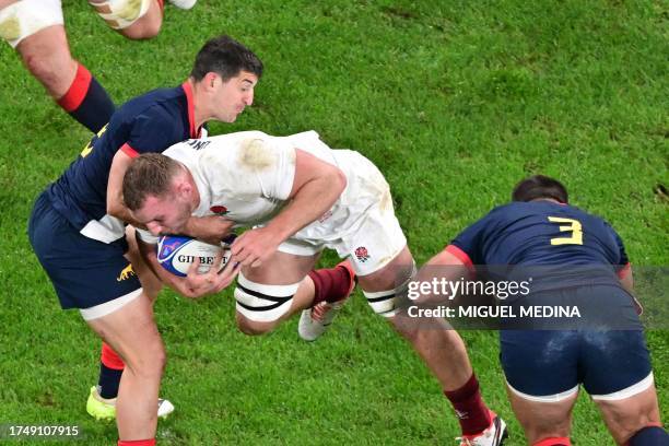 England's openside flanker Sam Underhill attempts to break away during the France 2023 Rugby World Cup third-place match between Argentina and...