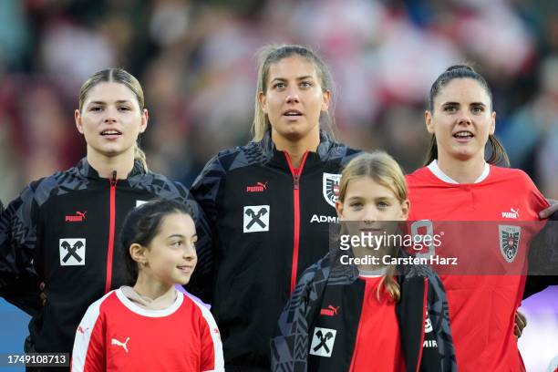 Eileen Cambel, Marina Georgieva and Sarah Zadrazil of Austria sings the national Antem during the UEFA Women's Nations League match between Austria...
