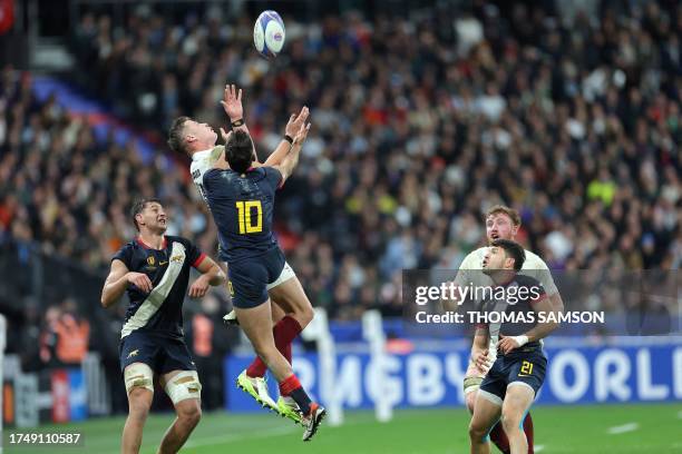 England's right wing Freddie Steward fights for the ball with Argentina's fly-half Santiago Carreras during the France 2023 Rugby World Cup...