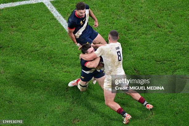 Argentina's left wing Mateo Carreras is tackled by England's number eight Ben Earl during the France 2023 Rugby World Cup third-place match between...