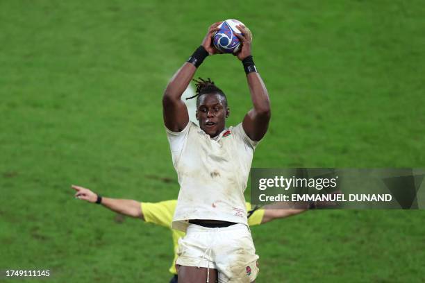 England's lock Maro Itoje grabs the ball in a line-out during the France 2023 Rugby World Cup third-place match between Argentina and England at the...